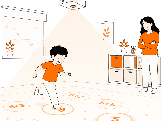 A child on an interactive floor with a maths exercise